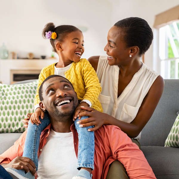 The image of a happy familly smiling